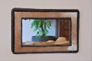 5000002 Rechthoekige spiegel met lederen boord <b><i>"Rechthoekige spiegel met lederen boord" </i> uit Kenia. </b><br>Artisanale rechthoekige spiegel, ingelijst in een frame van natuurlijk leder met geknoopte randen. <br><br><b>Diverse leder varianten:</b><br>- harig koeleder in lichtbruin met witte schakeringen, afgeboord met donkerbruine geknoopte lederen strengen<br>- harig koeleder in zwart met witte schakeringen, afgeboord met zwarte geknoopte lederen strengen<br>- harig koeleder in wit met zwarte schakeringen, afgeboord met zwarte geknoopte lederen strengen<br>- harig koeleder in roodbruin met witte schakeringen, afgeboord met donkerbruine geknoopte lederen strengen<br>- Struisvogelleder in lichtbruin, afgeboord met donkerbruine geknoopte lederen strengen<br>- Struisvogelleder in lichtbruin, afgeboord met lichtbruine geknoopte lederen strengen<br>- Struisvogelleder in zwart, afgeboord met zwarte geknoopte lederen strengen<br><br><b>Maten in cm:</b><br>- Large: H 36 - B 57 <br>- Small: H 23 - B 31.<br><br>Door handmatige productie kunnen maten licht afwijken. 5000002-01.jpg